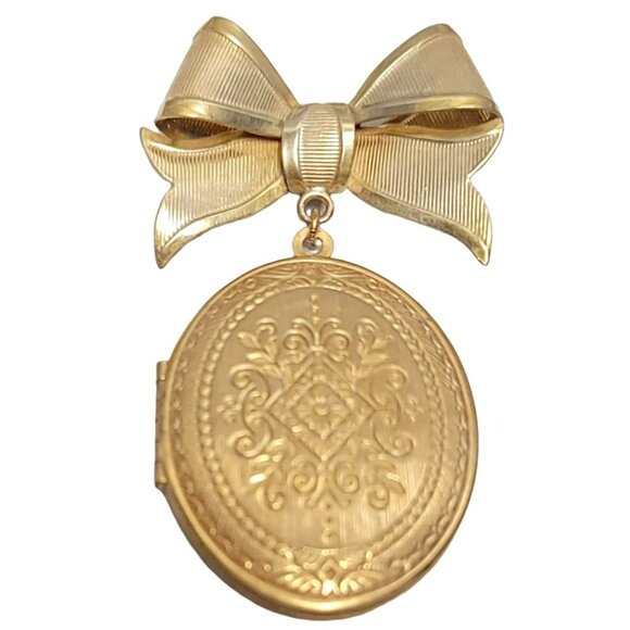 Miriam Haskell Gold-Tone Ribbon Bow Tie Oval Locket Pin Brooch - Picture 1 of 10